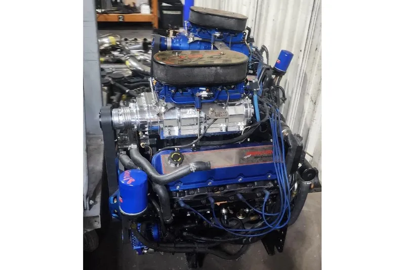 Slide: The Image of 2002 Fountain 38 Lightning engine with blue accents and dual air filters. - 43