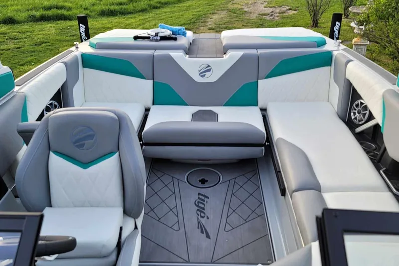 Slide: The Image of 2022 Tigé Z1 boat interior with stylish seating and modern design elements. - 9