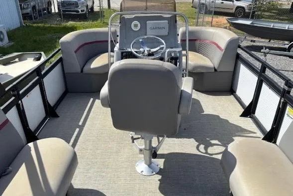 Slide: The Image of 2022 Angler Quest 26 All Sport boat interior with seating and steering console. - 5
