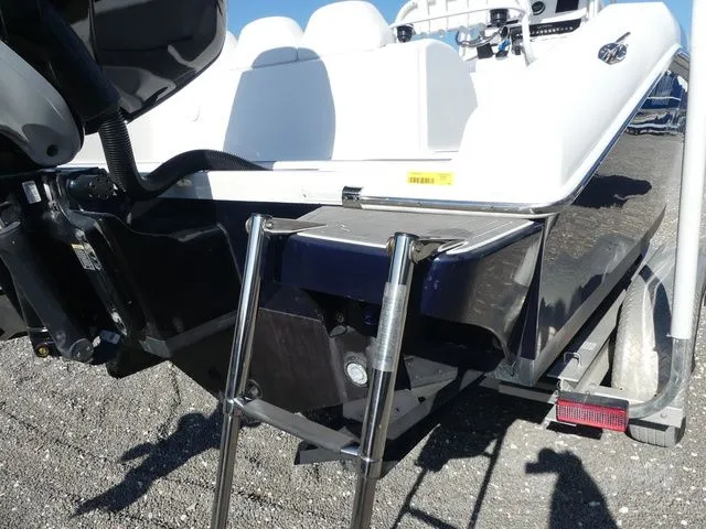 Slide: The Image of 2018 Carrera Sport Fishing boat with ladder and motor view. - 15