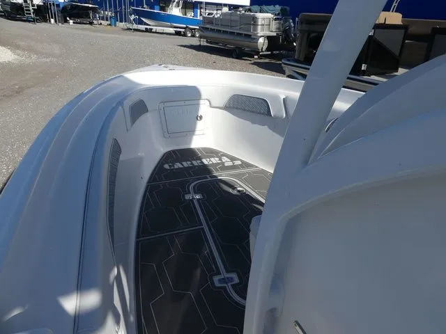 Slide: The Image of 2018 Carrera Boats Sport Fishing boat, bow view at marina. - 18