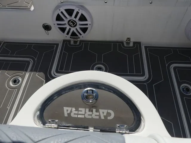 Slide: The Image of Interior of a 2018 Carrera Sport Fishing boat with speaker and flooring. - 24