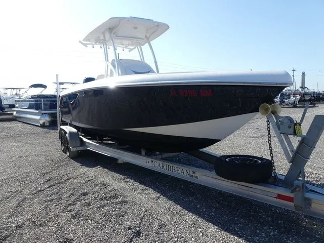 Slide: The Image of 2018 Carrera Sport Fishing boat on trailer outdoors. - 3