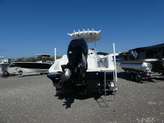 Slide: The Image of 2018 Carrera Sport Fishing boat with outboard motor on gravel lot. - 5