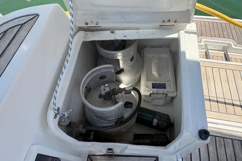 Slide: The Image of Storage compartment on a 2008 Wauquiez Centurion 40s yacht with gas cylinders and equipment. - 26