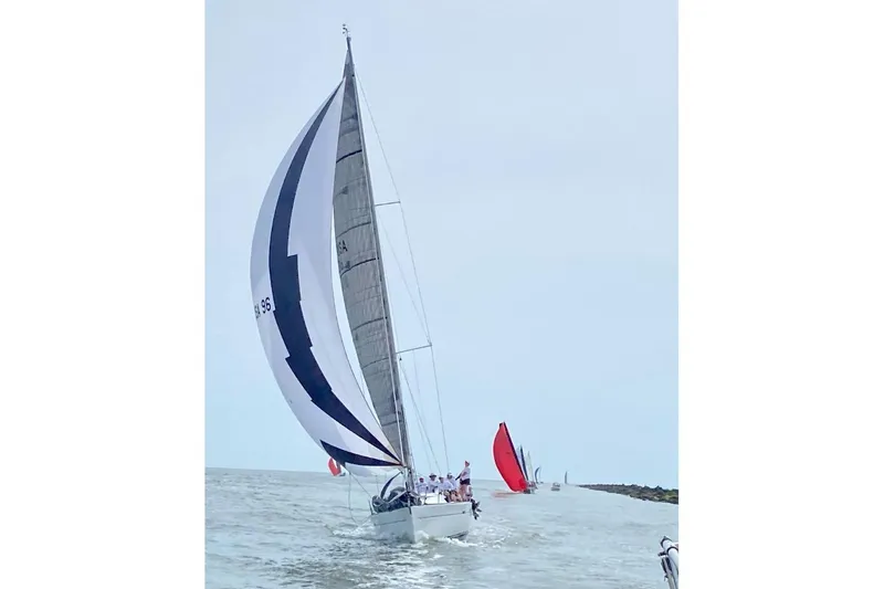 Slide: The Image of Sailing yacht Wauquiez Centurion 40s, 2008 model, with spinnaker on open water. - 51