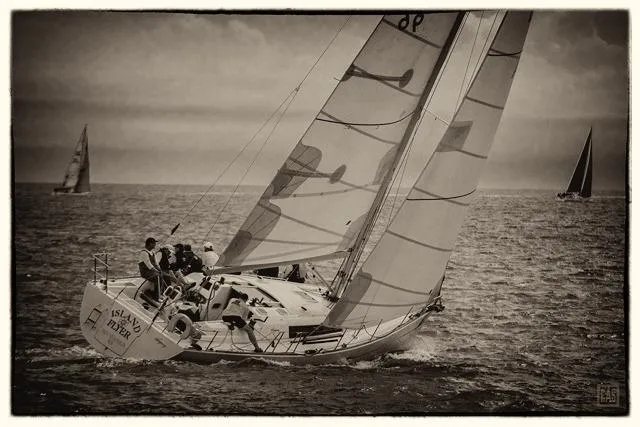 Slide: The Image of 2008 Wauquiez Centurion 40s sailing on open sea, vintage sepia tone. - 52