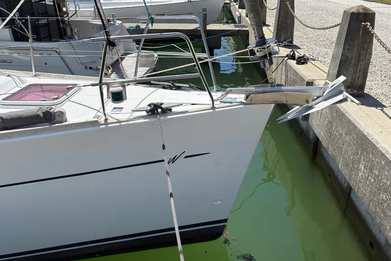 Slide: The Image of Wauquiez Centurion 40s yacht docked, showing anchor and bow details, 2008 model. - 7