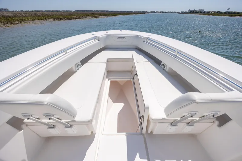 Slide: The Image of 2019 Invincible 36 Open Fisherman boat interior with spacious seating and storage. - 22