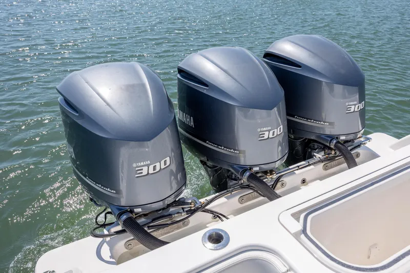 Slide: The Image of Triple Yamaha 300 outboard engines on a 2019 Invincible 36 Open Fisherman boat. - 8