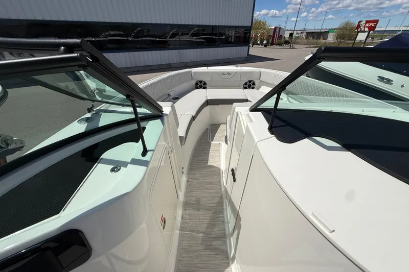Slide: The Image of 2026 Sea Ray SDX 250 boat interior with spacious seating and modern design. - 14