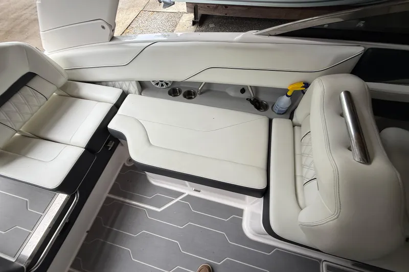 Slide: The Image of 2021 Regal LS4 Surf boat interior with modern dashboard and seating. - 22