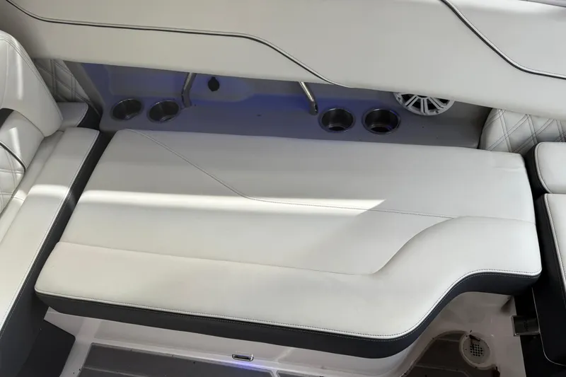 Slide: The Image of 2021 Regal LS4 Surf boat interior with modern dashboard and seating. - 29