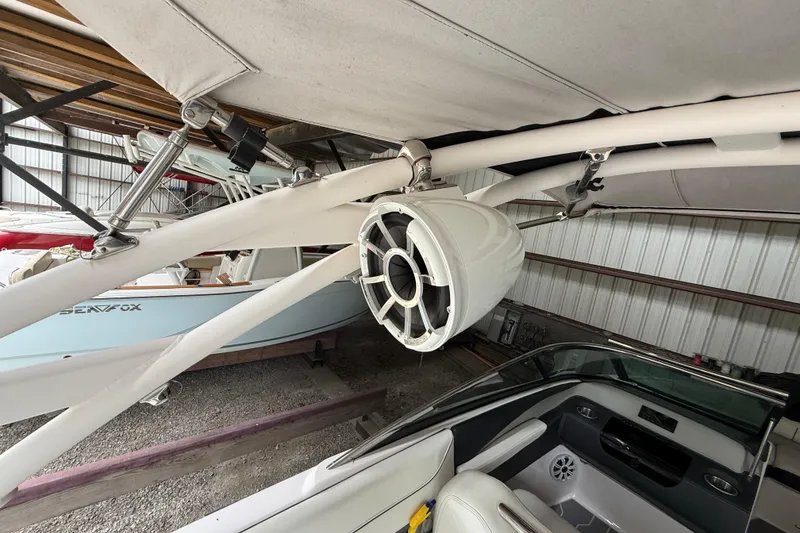 Slide: The Image of 2021 Regal LS4 Surf boat interior with white seating and modern design. - 30