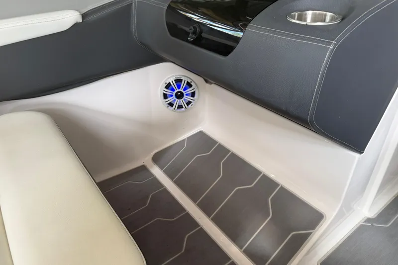 Slide: The Image of 2021 Regal LS4 Surf boat interior with modern seating and sleek design. - 31