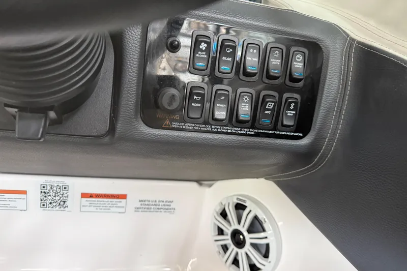 Slide: The Image of 2021 Regal LS4 Surf boat interior with white leather seating and modern design. - 32