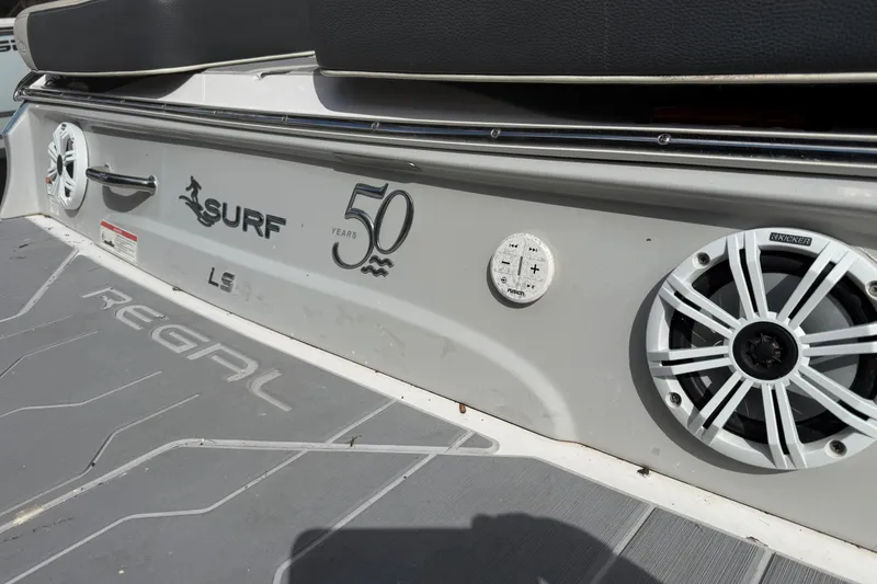 Slide: The Image of Interior seating of 2021 Regal LS4 Surf boat, featuring luxurious white upholstery. - 35