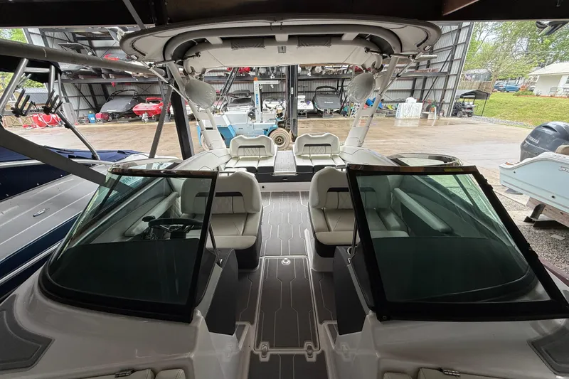 Slide: The Image of 2021 Regal LS4 Surf boat with mounted speaker in storage. - 40