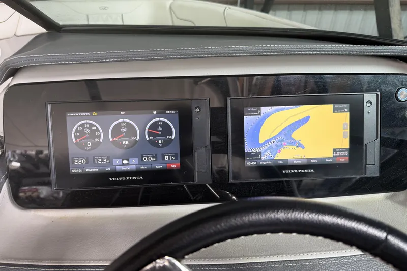 Slide: The Image of Interior of 2021 Regal LS4 Surf boat with speaker and cup holder. - 41