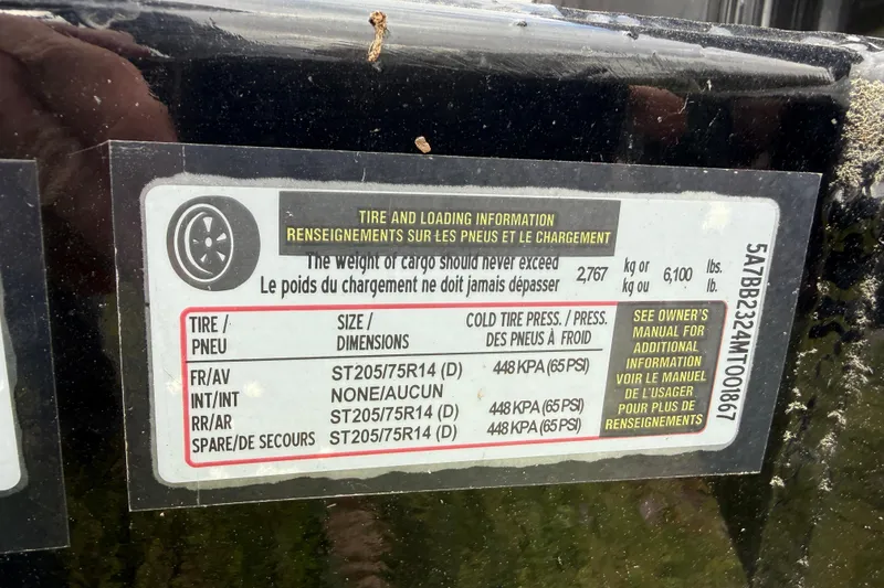 Slide: The Image of 2021 Regal LS4 Surf boat with speakers and 50th anniversary logo. - 45