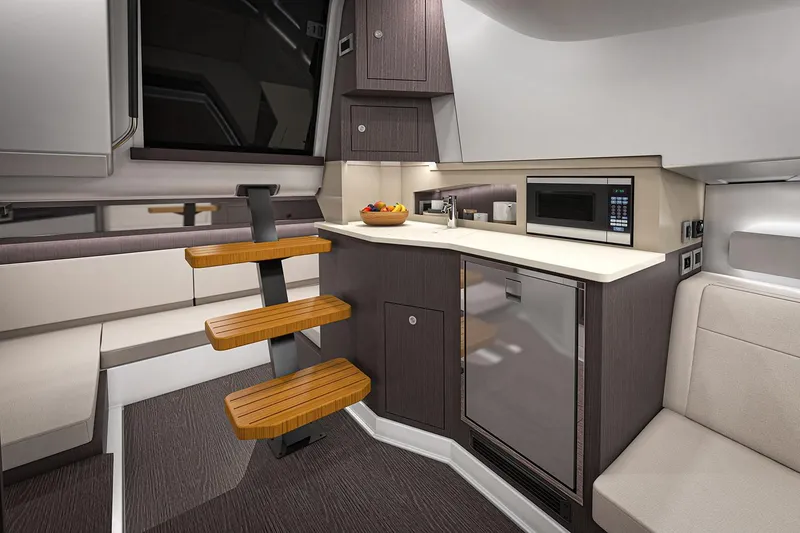Slide: The Image of Manufacturer Provided Image: Luxurious 2025 Sea Ray Sundancer 370 interior with elegant seating and ocean view. - 13