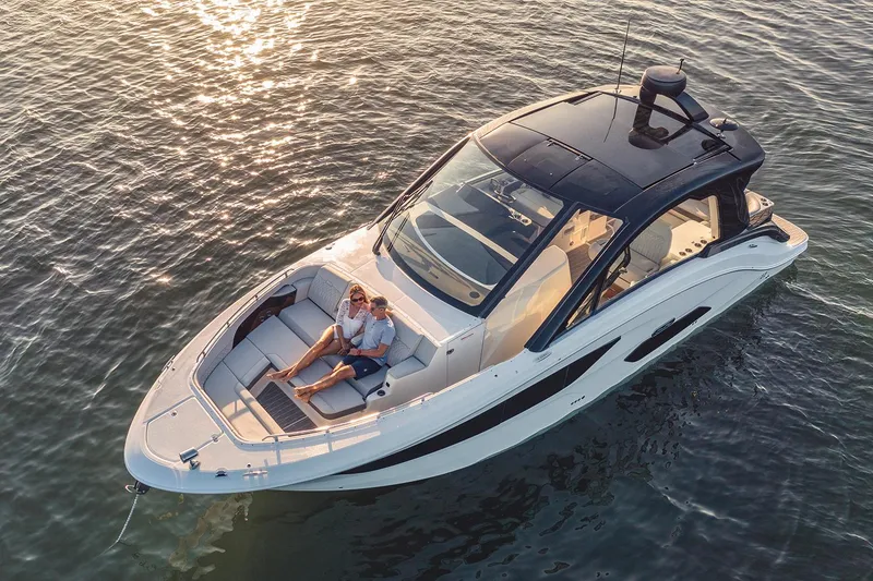 Slide: The Image of 2026 Sea Ray Sundancer 370 on trailer in a garage setting. - 3