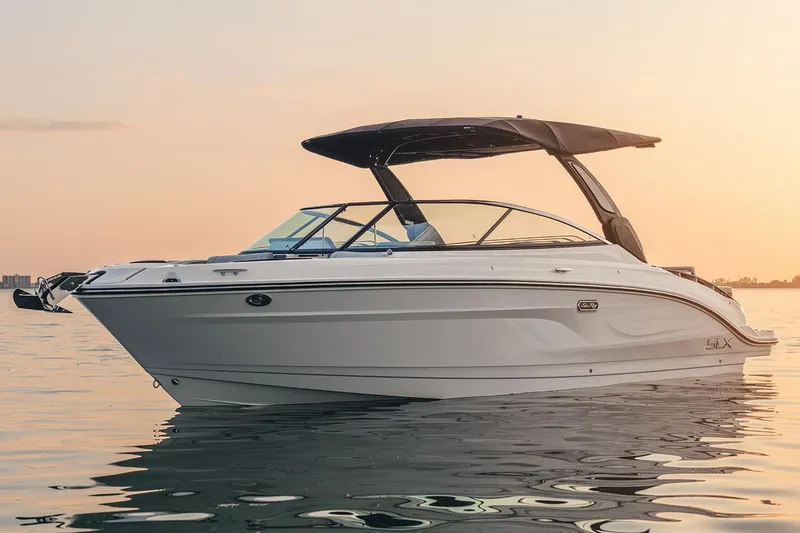 The Image of Manufacturer Provided Image: 2025 Sea Ray SLX 280 boat on calm water at sunset. - 0