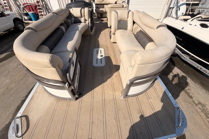 Slide: The Image of 2021 Premier 250 Grand Majestic pontoon boat with spacious seating and elegant design. - 5