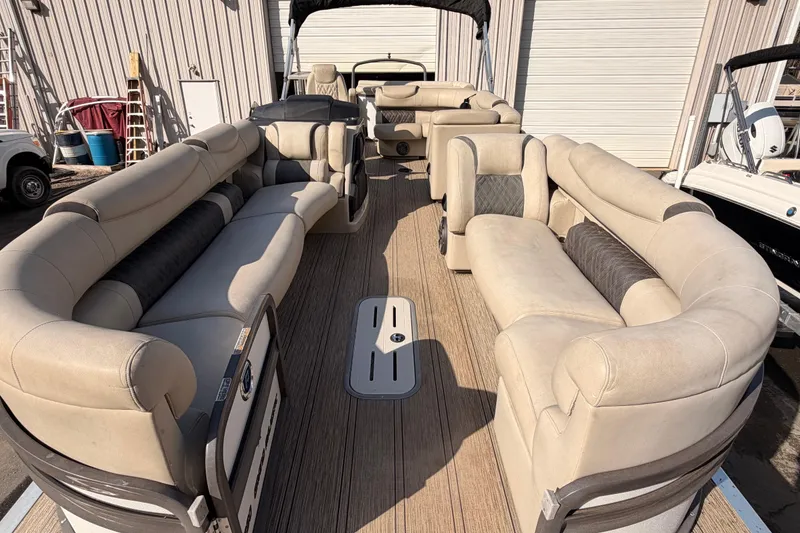 Slide: The Image of Luxurious 2021 Premier 250 Grand Majestic pontoon boat with spacious seating and elegant design. - 6