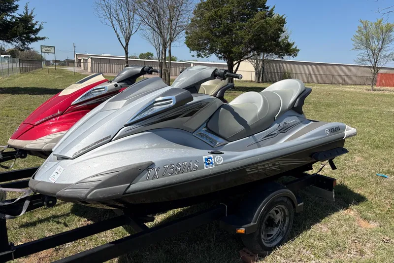 Slide: The Image of 2008 Yamaha WaveRunner FX Cruiser SHO on trailer, parked on grass. - 2