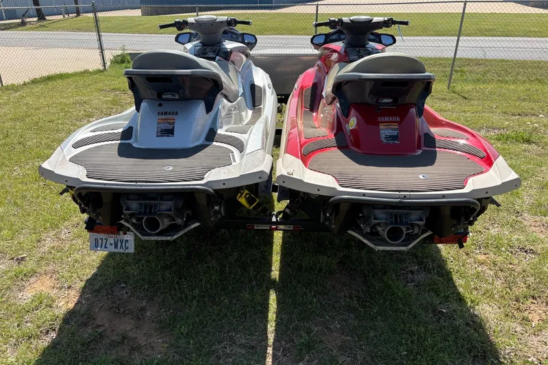 Slide: The Image of Two 2008 Yamaha WaveRunner FX Cruiser SHO jet skis parked on grass. - 3