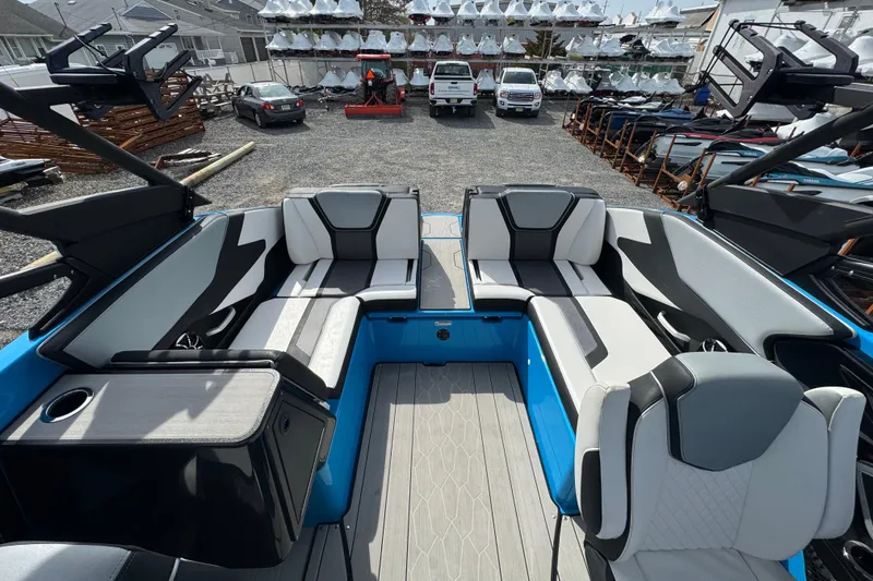 Slide: The Image of 2022 Yamaha Boats 255XD interior with modern seating and sleek design. - 9