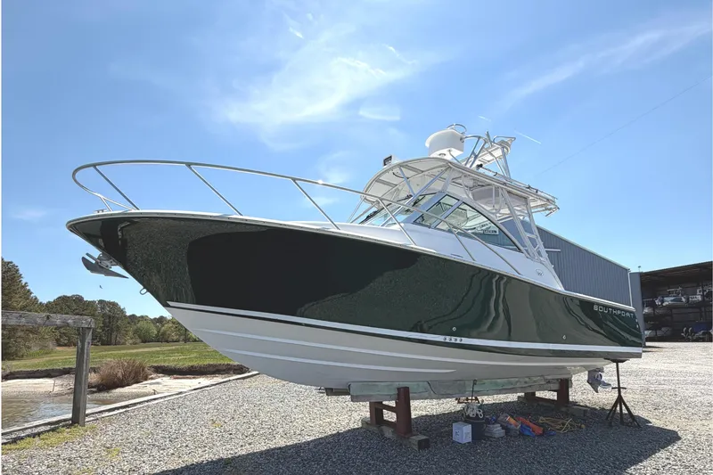 Slide: The Image of 2008 Southport 28 Tournament Express boat on display under clear blue sky. - 1