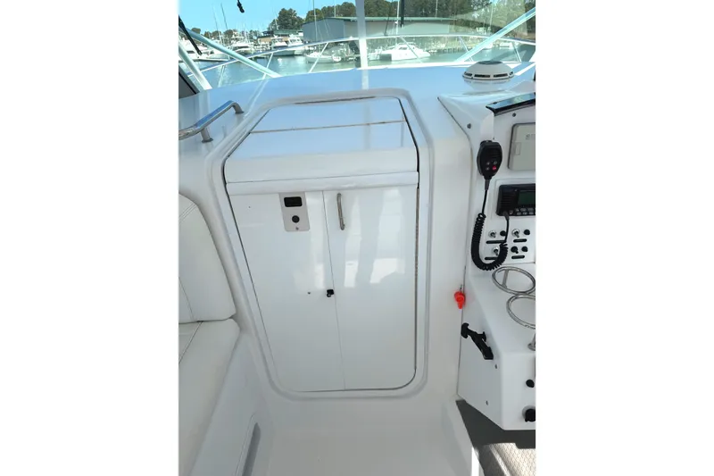 Slide: The Image of 2008 Southport 28 Tournament Express cockpit with control panel and seating area. - 11