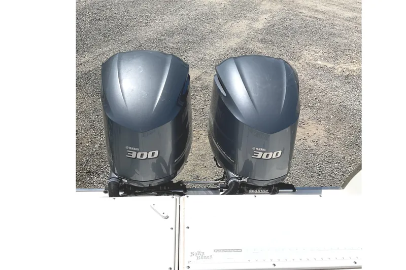 Slide: The Image of Twin Yamaha 300 outboard engines on a 2008 Southport 28 Tournament Express boat. - 18