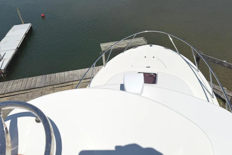 Slide: The Image of 2008 Southport 28 Tournament Express boat docked at a marina, viewed from above. - 21