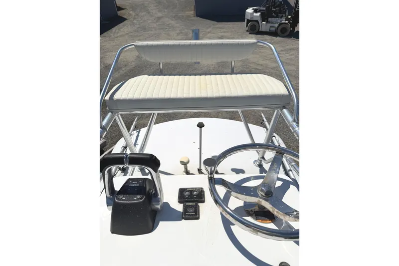 Slide: The Image of Helm of 2008 Southport 28 Tournament Express boat with steering wheel and controls. - 22