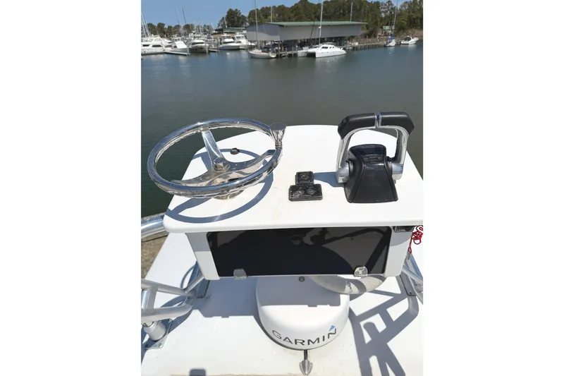 Slide: The Image of Helm of 2008 Southport 28 Tournament Express with Garmin equipment, docked at marina. - 23