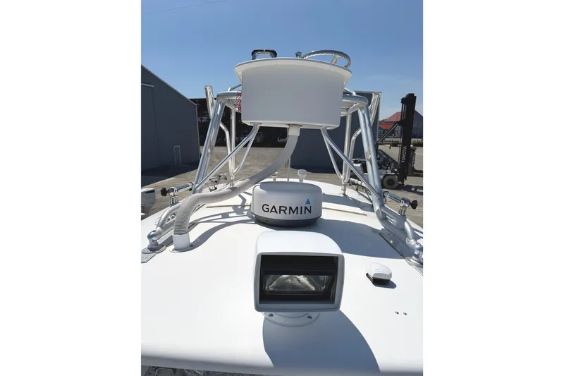 Slide: The Image of 2008 Southport 28 Tournament Express boat with Garmin radar and spotlight on deck. - 24