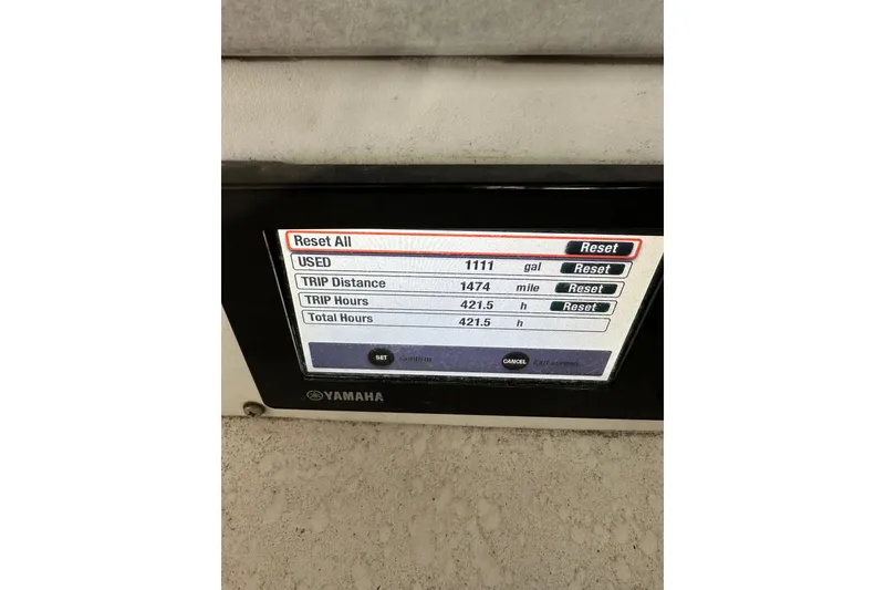 Slide: The Image of Yamaha display showing fuel usage and trip data on 2008 Southport 28 Tournament Express. - 28