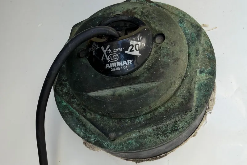 Slide: The Image of Airmar transducer on 2008 Southport 28 Tournament Express boat, showing cable and mounting. - 42