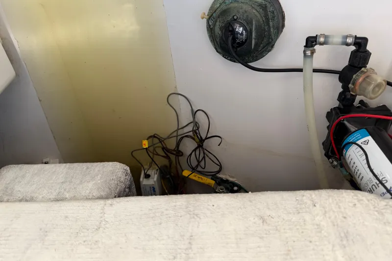 Slide: The Image of Engine compartment of a 2008 Southport 28 Tournament Express boat, showing wiring and components. - 43