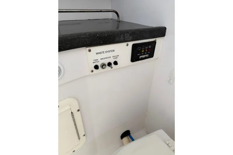 Slide: The Image of Waste system controls on 2008 Southport 28 Tournament Express boat. - 45