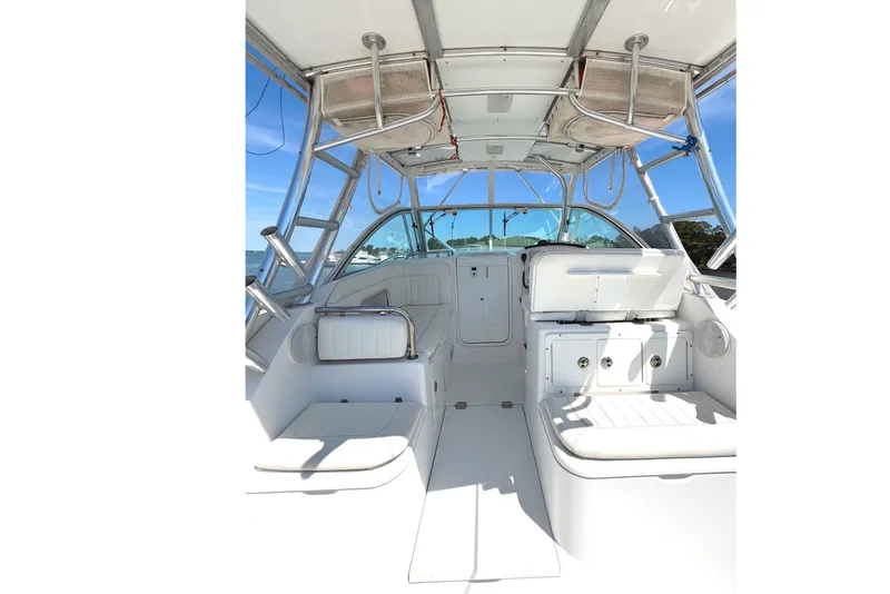 Slide: The Image of 2008 Southport 28 Tournament Express boat interior with seating and helm, showcasing sleek design. - 6
