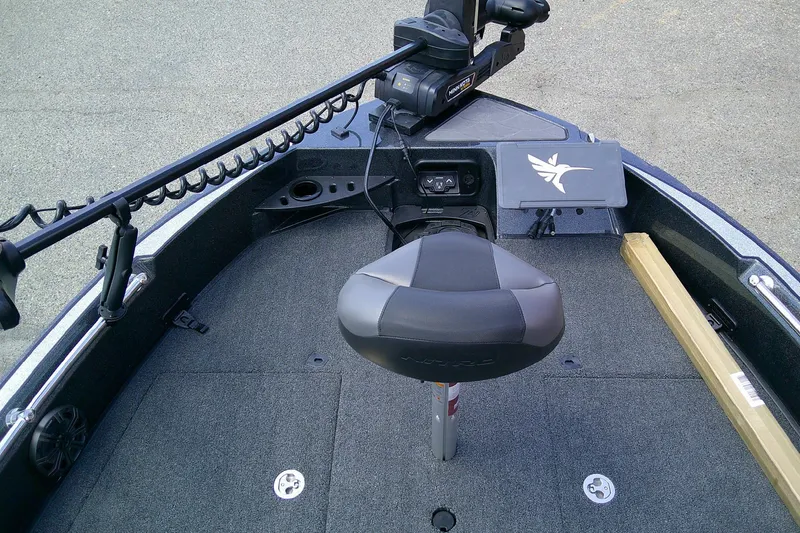 Slide: The Image of Front deck of a 2026 Nitro ZV20 boat with a trolling motor and seat. - 12