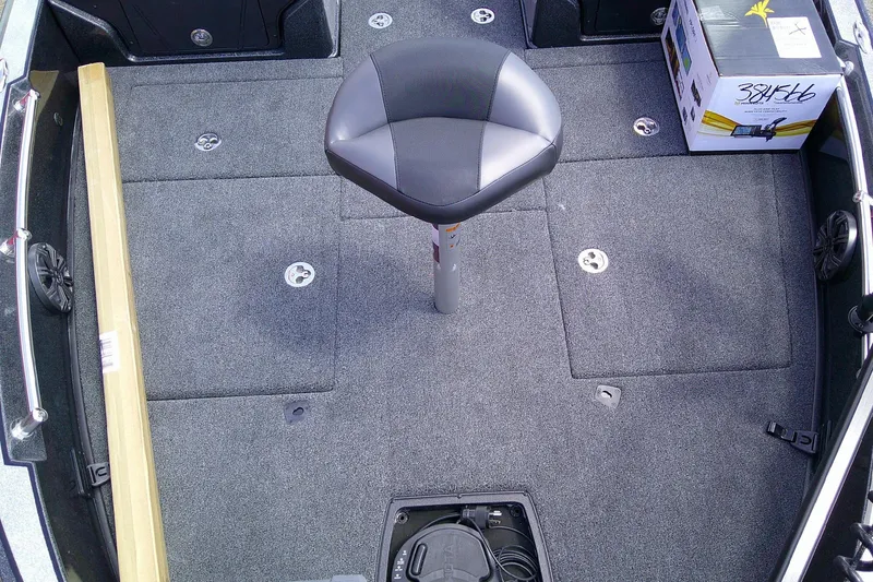 Slide: The Image of Interior of 2026 Nitro ZV20 boat with seat and storage compartments. - 13