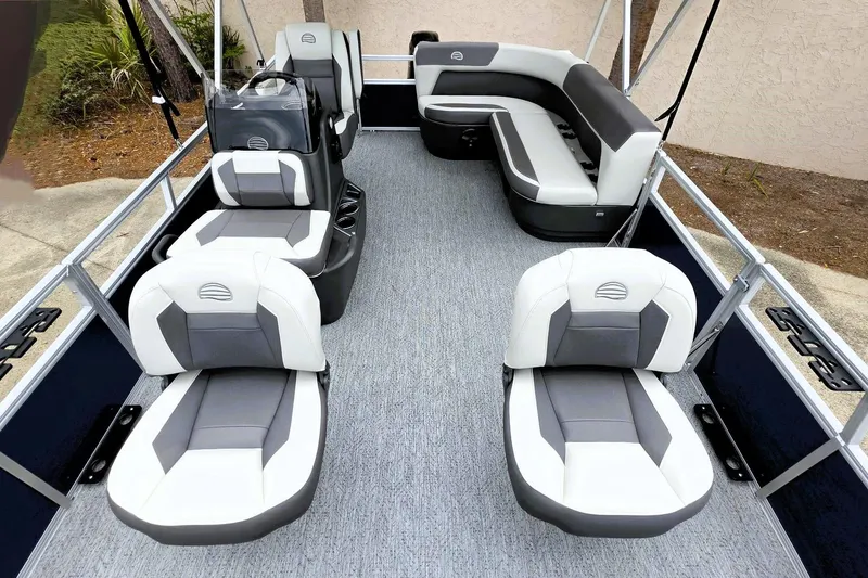 Slide: The Image of 2026 Sun Tracker Bass Buggy 16 XL Select pontoon boat interior with seating arrangement. - 8