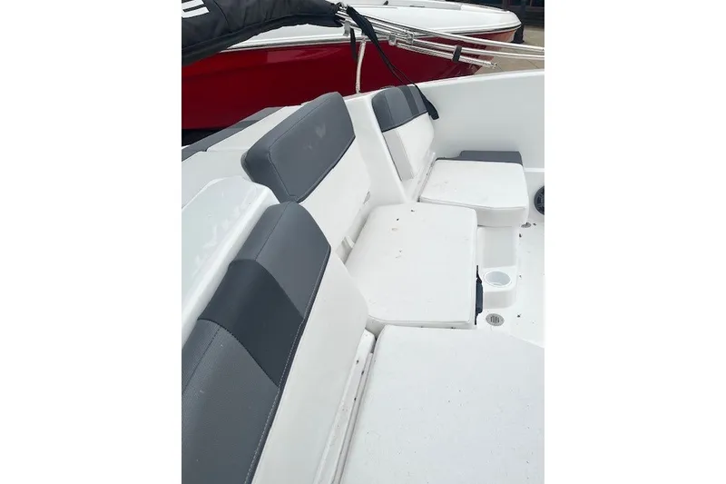 Slide: The Image of 2026 Tahoe T16 boat interior with gray and white seating arrangement. - 5