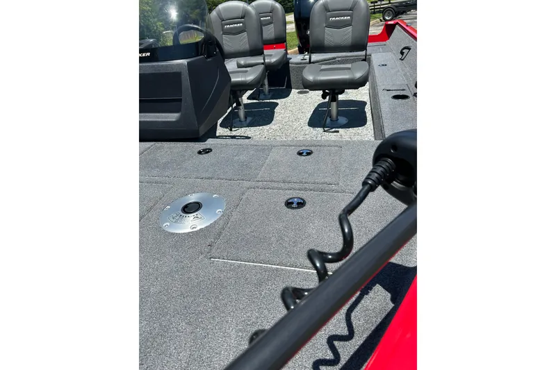 Slide: The Image of 2026 Tracker Pro Guide V-16 SC boat interior with seating and deck features. - 6