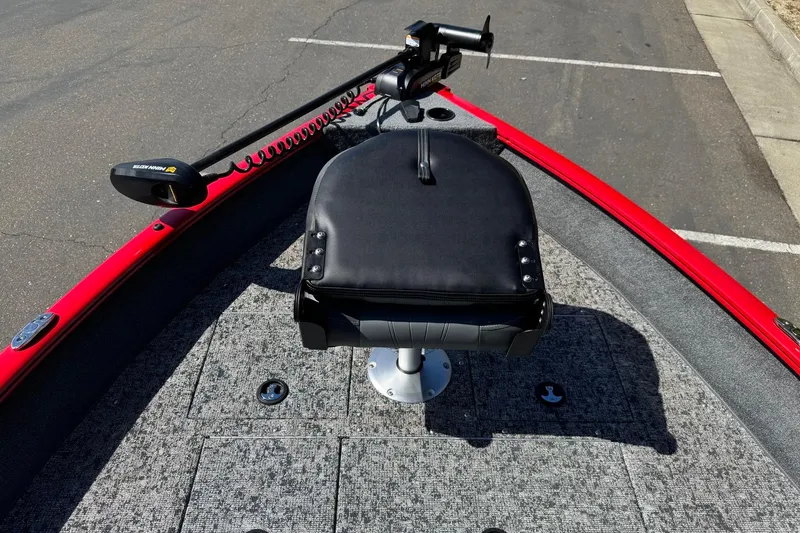 Slide: The Image of 2026 Tracker Pro Guide V-16 SC boat with black seat and trolling motor. - 8